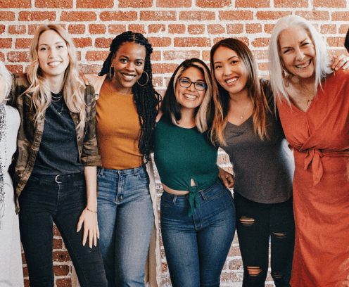 Group of women standing together.