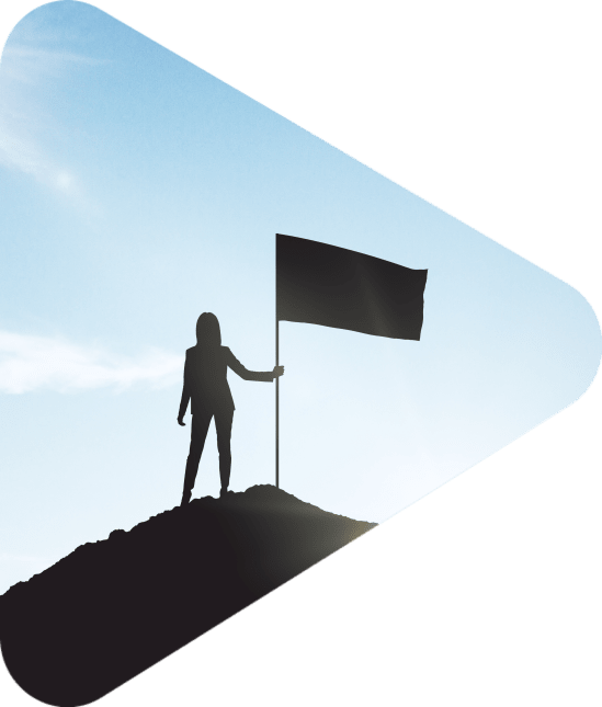 woman with flag silhouette at summit