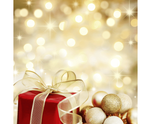 Red Christmas gift box and baubles on background of defocused golden lights.
