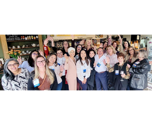 CREW east bay members at an event smiling and standing together