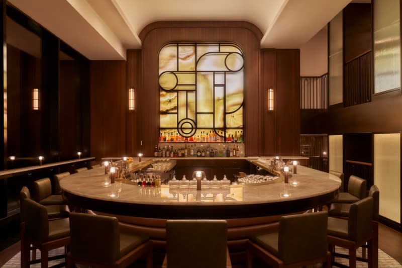 Elegant bar seating with stained glass.