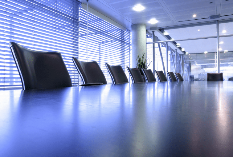 boardroom table and chairs photo taken from table