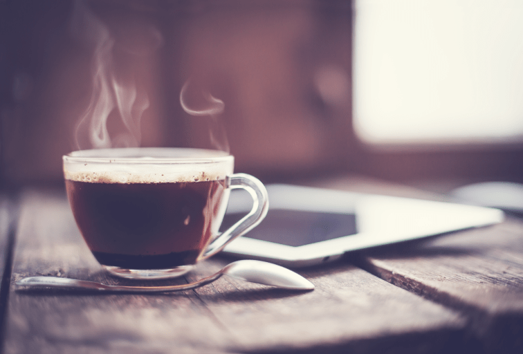 cup-coffee-on-old-wooden-table