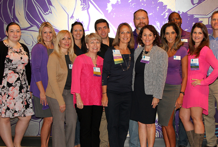 group shot of members at evenr fourteen people