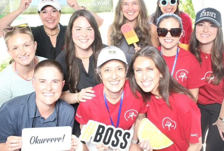 Women posing with props