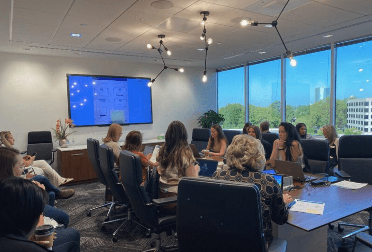 Women sitting in a conference room