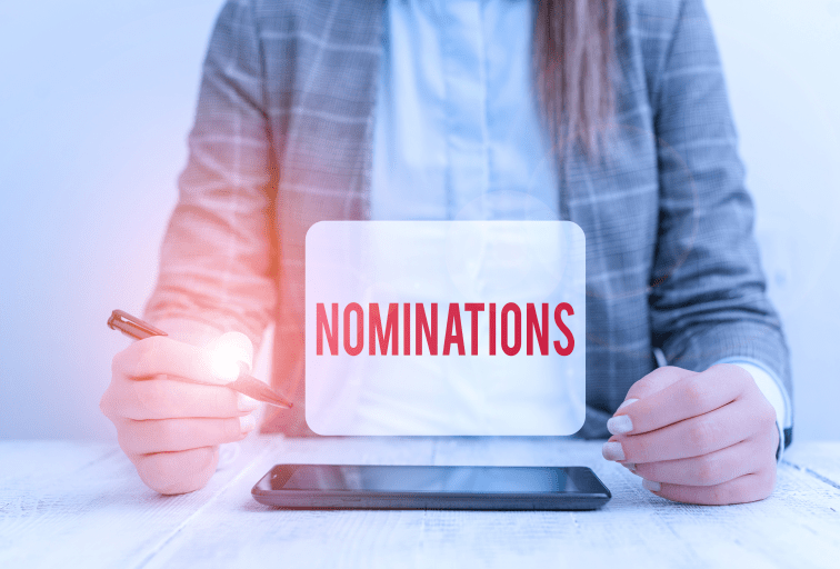 Text sign showing Nominations. Business photo text the act of officially suggesting someone for a job or position Business woman sitting with mobile phone and pen in the hand