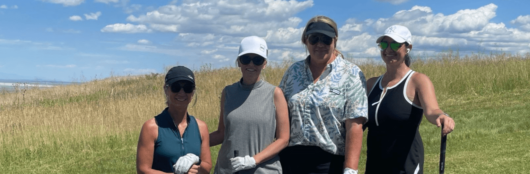 four female golfers