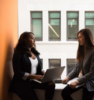 Women working in front of window