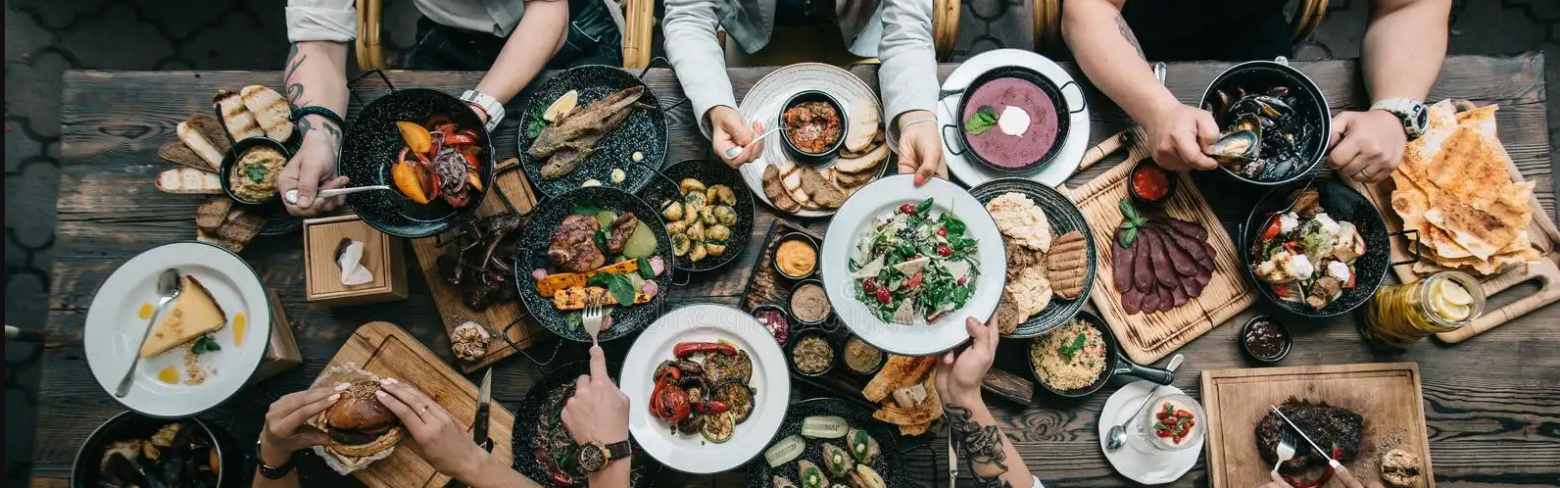 variety of food spread out on a table