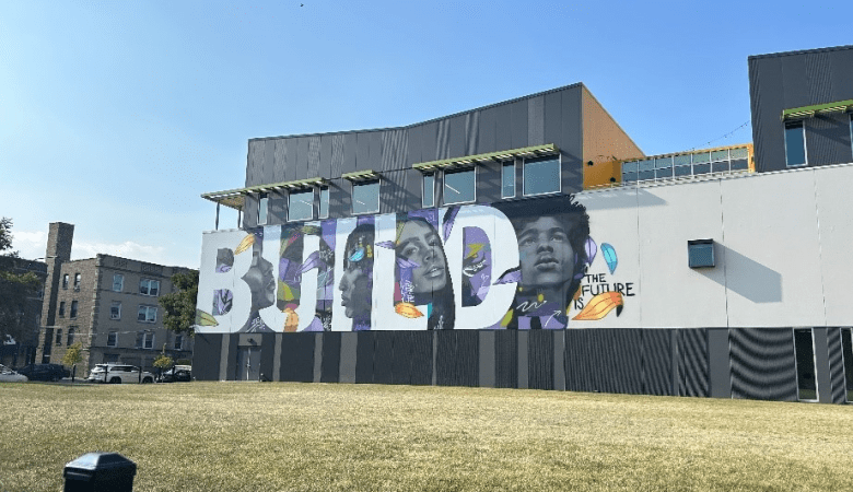 Diversity BUILD mural in the side of a building