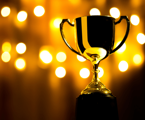 trophy with spotlights in the background