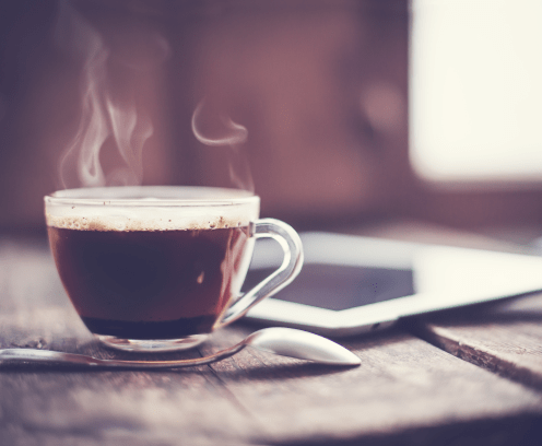 cup-coffee-on-old-wooden-table