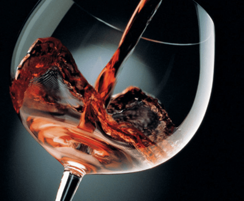 Wine being poured into a wine glass