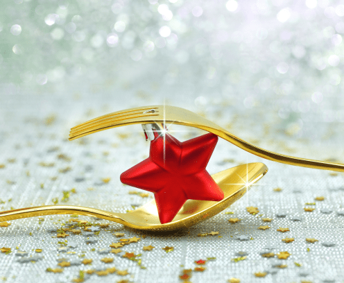 holiday-golden-cutlery-on-festive-background