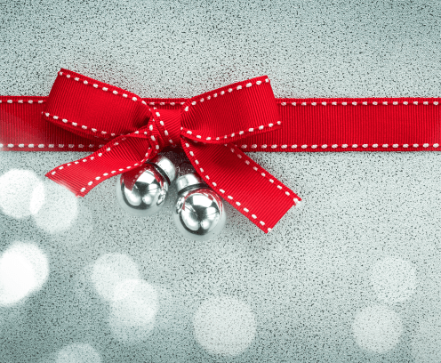 red-ribbon-bow-silver-ornament-textured-background