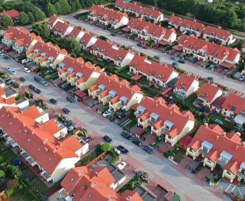 Aerial view on estate of twin houses in city area.