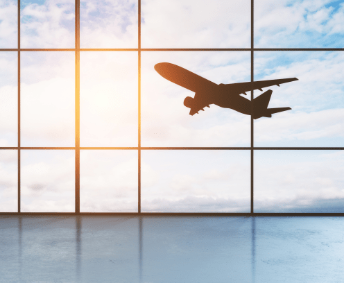 airport hall window floor-to-ceiling with take off aircraft behind it. 3d rendering