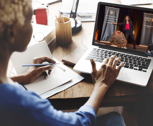 woman-desk-crew-network-event-on-laptop