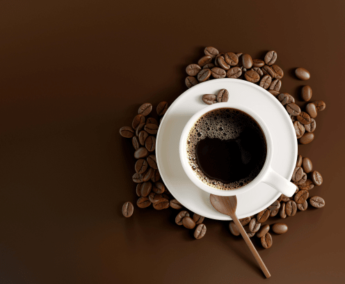 coffee-cup-beans-on-dark-brown-background-flipped
