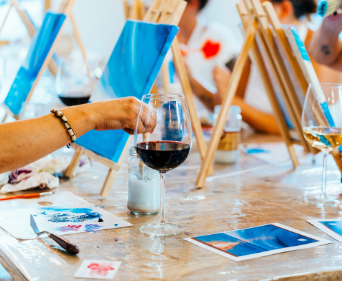 Sip and Paint Event: Women Creating Art over Wine Glasses