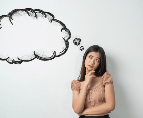 portrait of asian girl thinking and looking up to blank bubble speech. ready for your design