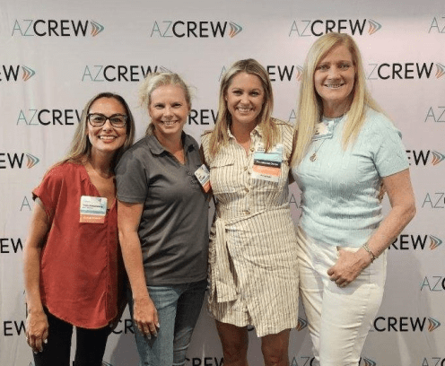 Four Women posing for a group photo