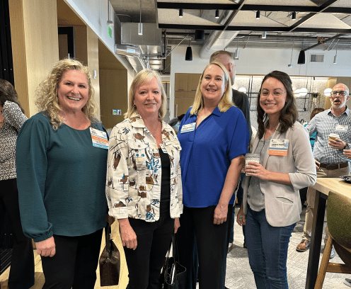 Four women at an AZCREW event.