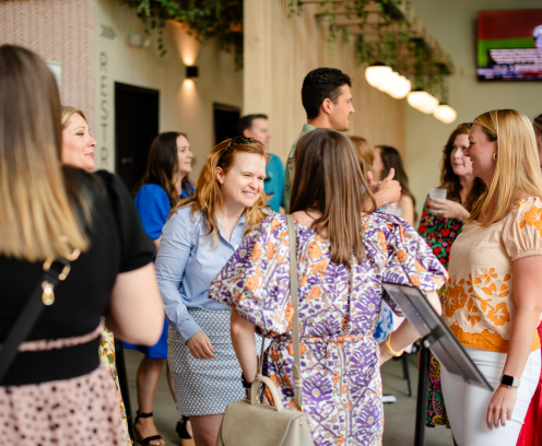people standing having conversations
