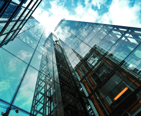 View looking up at skyscrapers.