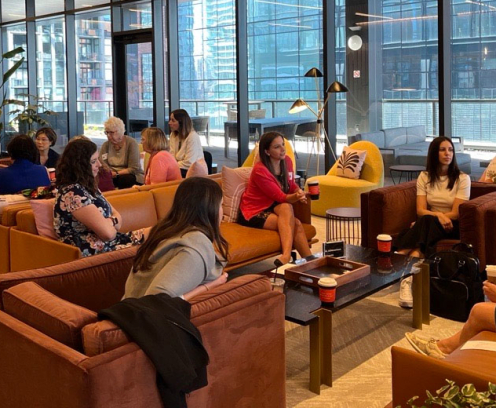 group of women sitting and having a discussion