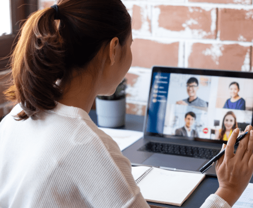 Young Asian businesswoman work at home and virtual video conference meeting with colleagues business people, online working, video call due to social distancing at home office