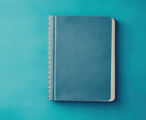 Blue Spiral Notebook with Gratitude Journaling Section Promoting Mindfulness and Positive Planning for Productivity and Self Care