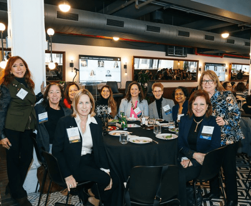 Women dining at CREW NY event
