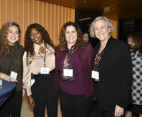 Four diverse ladies at CREW Chicago 2024 Annual Meeting