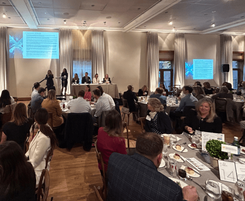 group_of_people_sitting_at_a_luncheon