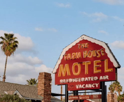 The Farm House Motel sign
