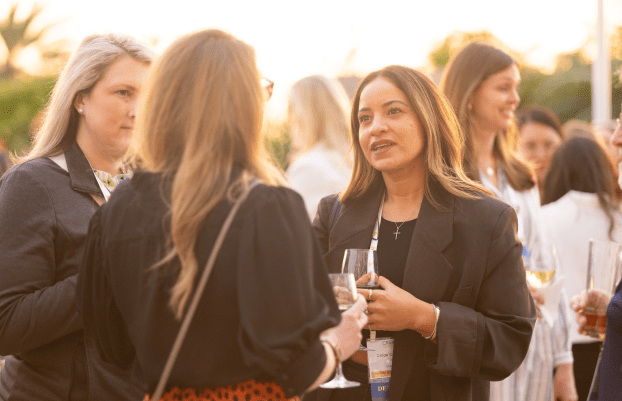 CREW Network members networking outside