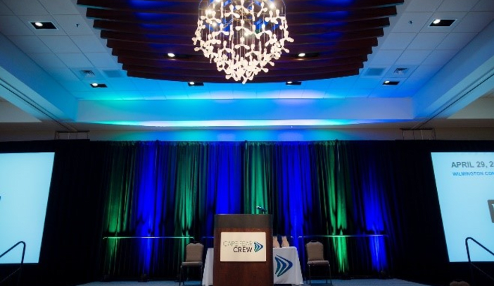 Stage with podium and chandelier
