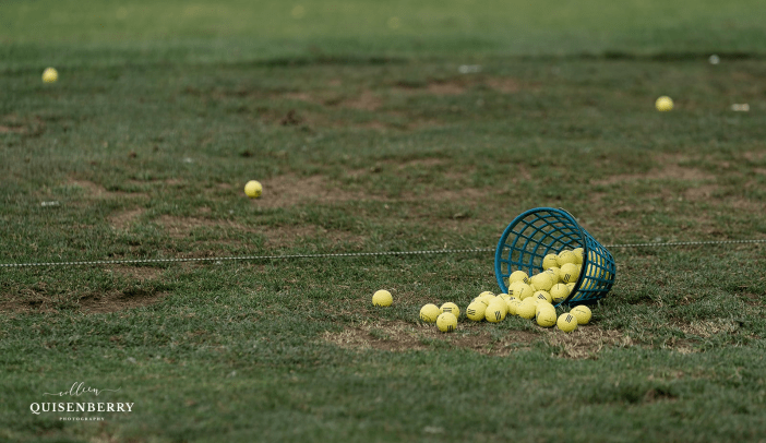 spilled bucket of golf balls