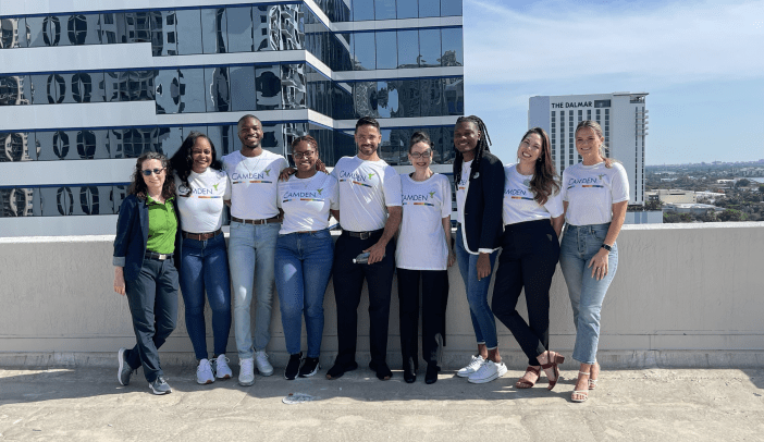 Camden olas team on a rooftop