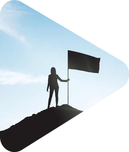 woman with flag silhouette at summit