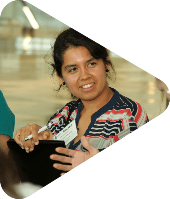 Woman smiling at CREW networking event