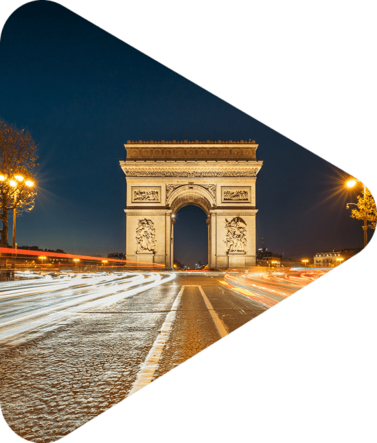 The Arc de Triomphe de l'Etoile (Triumphal Arch of the Star) at Night. It is one of the most famous monuments in Paris, standing at the western end of the Champs-Elyseees.