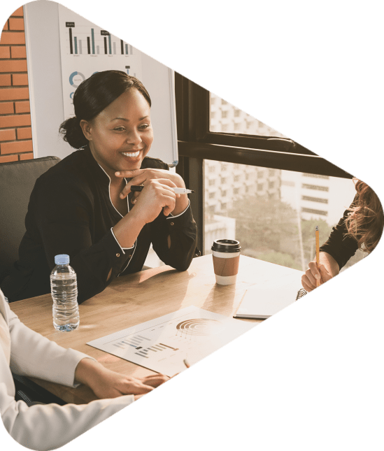 Happy diverse businesswoman leaders in meeting room