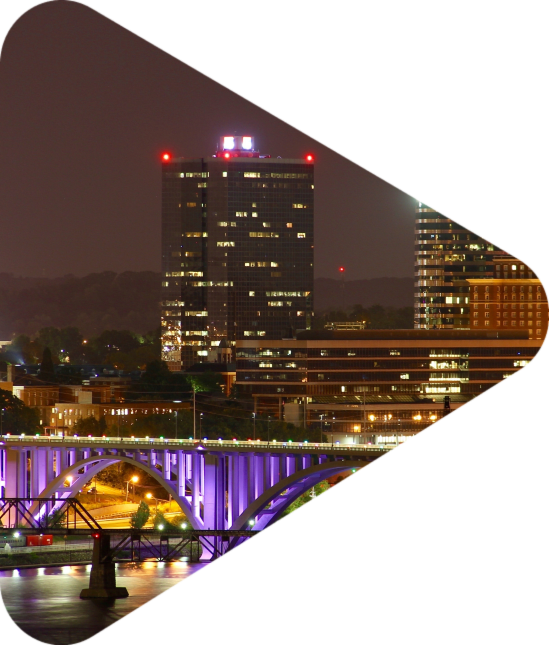 The colorful lights of the Henley Street Bridge light up the river as I take a peaceful night hike up to the Bluffs in South Knoxville.