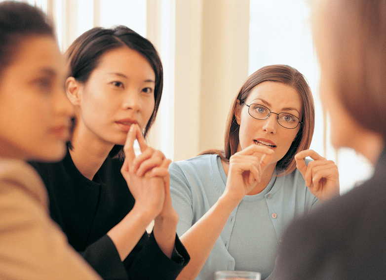 diverse women discussion speaker foreground