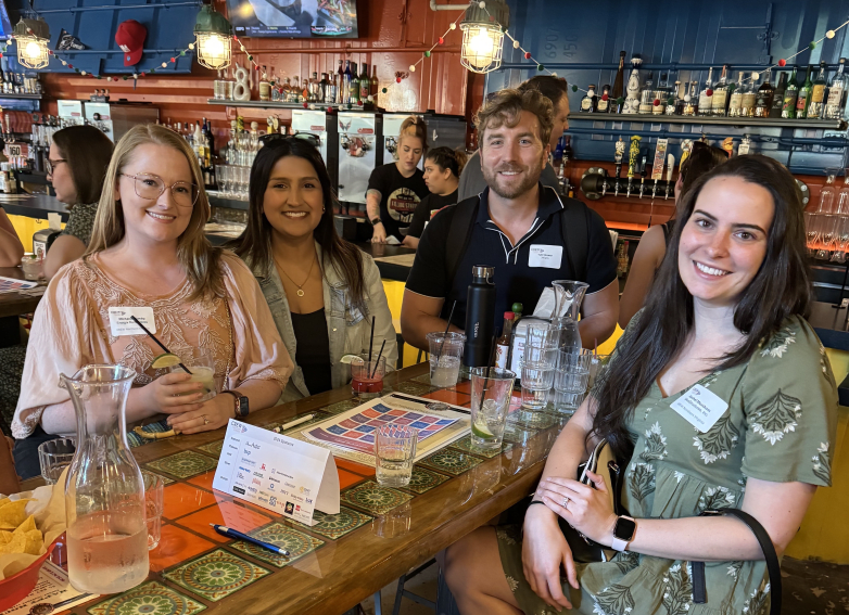 four-people-at-pub-restaurant-cropped