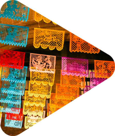 Colorful tissue paper cut-out flags "papel picado" for the day of the dead in mexico