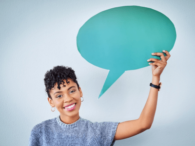 Studio, woman and portrait with speech bubble for opinion, voice and communication with mockup. Female person, advertising and marketing for product placement, billboard and info by gray background.